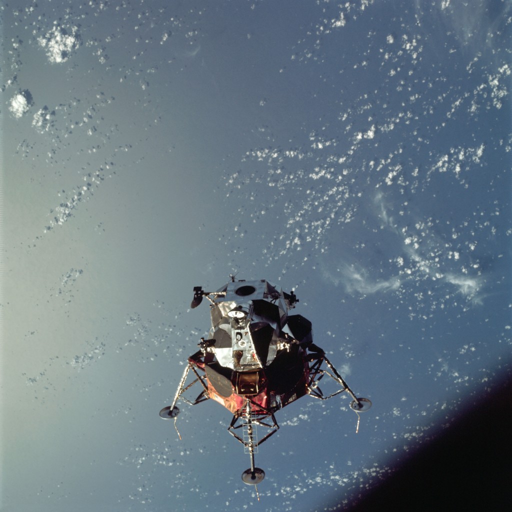 AS09-21-3183 (7 March 1969) --- A view of the Apollo 9 Lunar Module (LM) "Spider" in a lunar landing configuration, as photographed from the Command and Service Modules (CSM) on the fifth day of the Apollo 9 Earth-orbital mission. The landing gear on the "Spider" has been deployed. Lunar surface probes (sensors) extend out from the landing gear foot pads. Inside the "Spider" were astronauts James A. McDivitt, Apollo 9 commander; and Russell L. Schweickart, lunar module pilot. Astronaut David R. Scott, command module pilot, remained at the controls in the Command Module (CM), "Gumdrop," while the other two astronauts checked out the LM. Schweickart, lunar module pilot, is photographed from the CM "Gumdrop" during his extravehicular activity (EVA) on the fourth day of the Apollo 9 Earth-orbital mission. The CSM is docked with the LM. Astronaut James A. McDivitt, Apollo 9 commander, was inside the LM "Spider." Astronaut David R. Scott, command module pilot, remained at the controls in the CM.